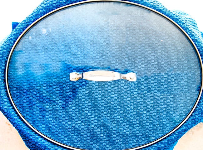 FOOL PROOF Crockpot Chocolate Peanut Clusters are not only crazy delicious but are SO easy! They make the best make ahead, stress free gifts! This post also includes tips and tricks to make them successful every time!