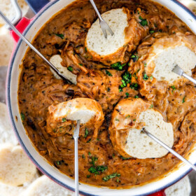 This French Onion Cheese Fondue with rich, deeply caramelized onions and bubbling Gruyere and Smoked Gouda is a party MUST! Its easy to prepare, crazy delicious and the hit of every party!