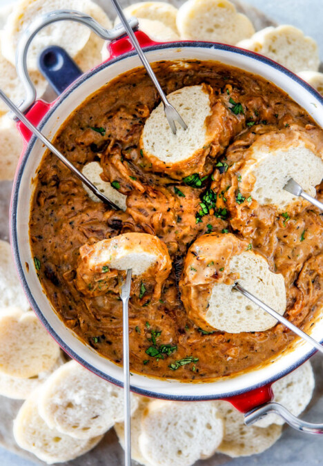  This French Onion Cheese Fondue with rich, deeply caramelized onions and bubbling Gruyere and Smoked Gouda is a party MUST!  Its easy to prepare, crazy delicious and the hit of every party! 