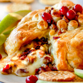 Rich and creamy Baked Brie in Puff Pastry is always a total luxuriously tasting crowd pleaser with minimal effort! (step by step pictures included) It can be prepped in advance then baked when you're ready for company!