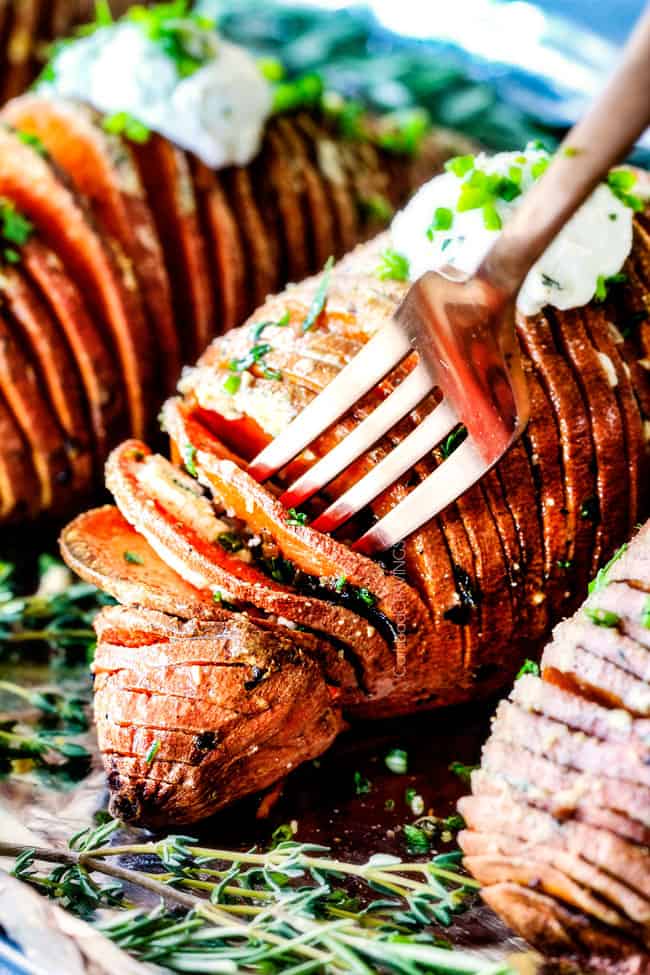 These Hasselback Sweet Potatoes are tender, melt-in-your-mouth and bursting with garlic herb, butter flavor! They look wonderfully gourmet for holidays and special occasions but are everyday easy!