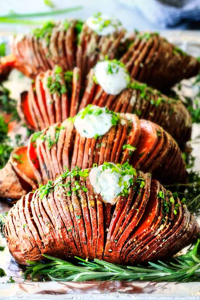 These Hasselback Sweet Potatoes are tender, melt-in-your-mouth and bursting with garlic herb, butter flavor! They look wonderfully gourmet for holidays and special occasions but are everyday easy!