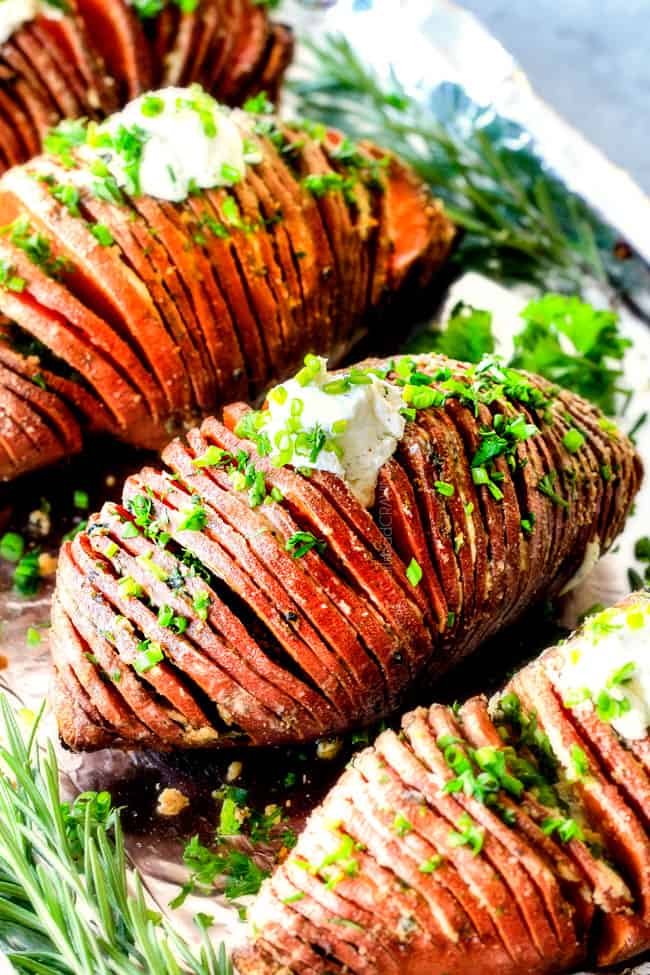 These Hasselback Sweet Potatoes are tender, melt-in-your-mouth and bursting with garlic herb, butter flavor! They look wonderfully gourmet for holidays and special occasions but are everyday easy!