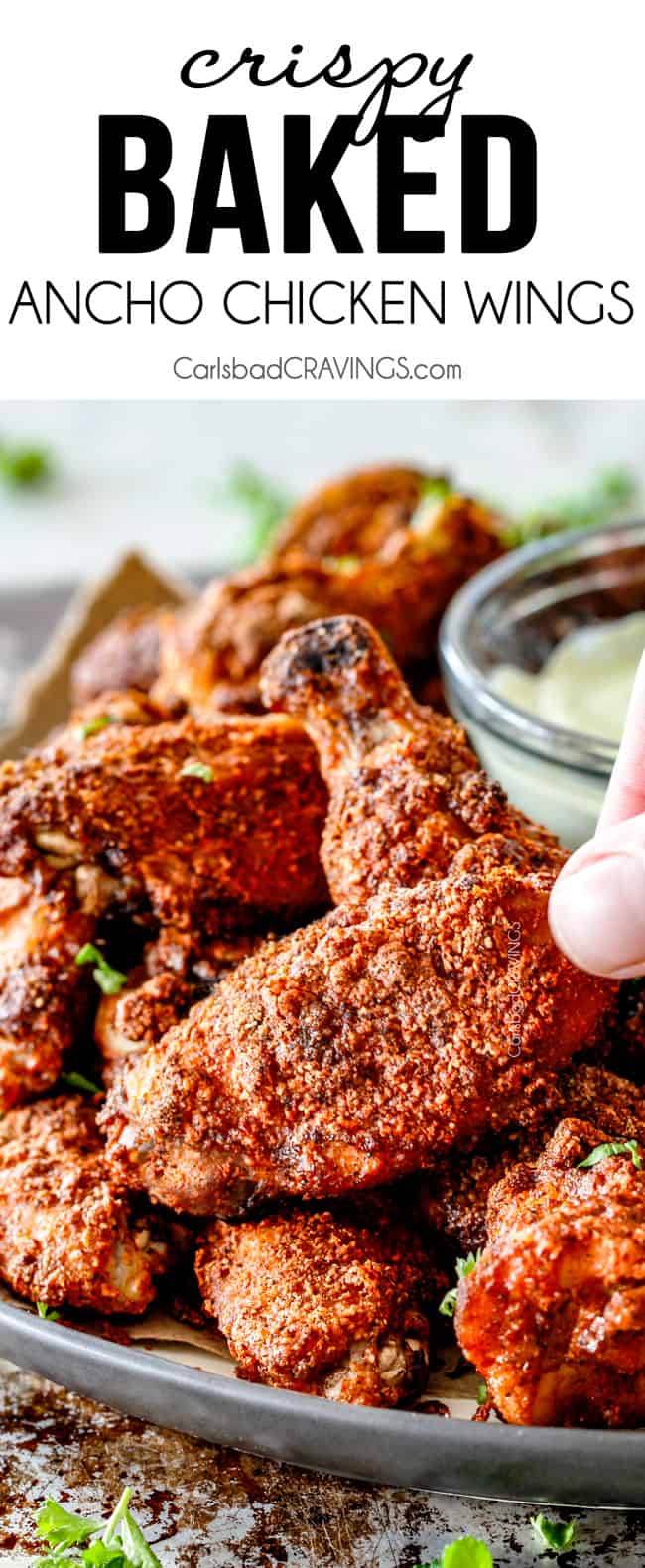Crispy Ancho Baked Chicken Wings are tossed in the most tantalizing spice rub, baked until juicy on the inside, crispy on the outside then dunked in creamy Avocado Ranch! These are so ADDICTING and you can prep them all in advance without the hassle, mess and heart attach of fried wings!
