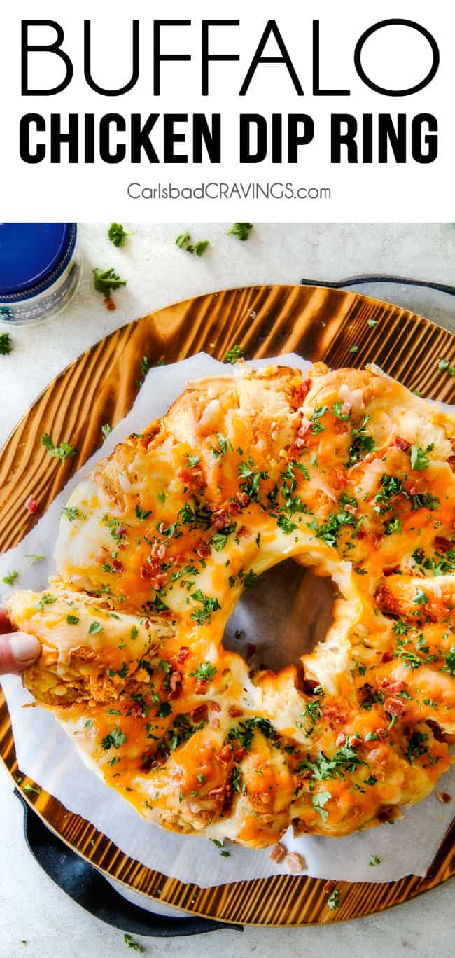 Mega flavorful Buffalo Chicken Dip Ring is your favorite decadent creamy, cheesy dip baked right into a buttery biscuit ring! Crazy delicious EASY crowd pleasing appetizer perfect for parties or game day! It may look super impressive but you won’t believe how easy it is!