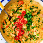 This EASY Thai Yellow Curry with Chicken tastes straight out of a restaurant!  Its wonderfully thick and creamy, bursting with flavor and veggies (I highly recommend the listed potatoes, cauliflower and peas) and all made in one pot! Definitely a hit at our house!