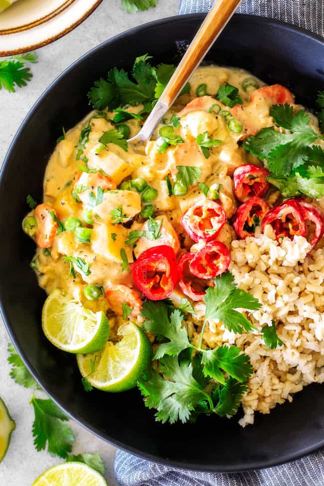This EASY Thai Yellow Curry with Chicken tastes straight out of a restaurant! Its wonderfully thick and creamy, bursting with flavor and veggies (I highly recommend the listed potatoes, cauliflower and peas) and all made in one pot! Definitely a hit at our house!