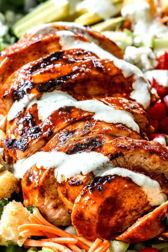 sliced buffalo chicken drizzled with blue cheese salad dressing