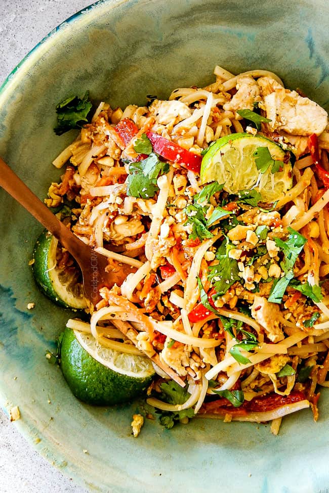 Chicken Pad Thai in a green blue bowl.