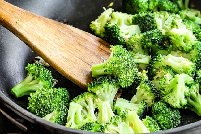 Showing how to make Mongolian Beef by stir frying broccoli