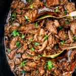 This is the BEST Slow Cooker Barbacoa Beef I have ever tried!  Super tender, juicy, EASY and bursting with rich, complex flavors!  Great for large crowds or make ahead meals and makes the best tacos, burritos, nachos, salads, etc!