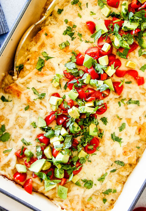 These are the BEST Green Chile Chicken Enchiladas I have ever had!!!  They are easy to make, satisfyingly rich, cheesy, creamy and saucy - no dry chicken enchiladas here! And the homemade green chile sour cream white sauce is out of this world!