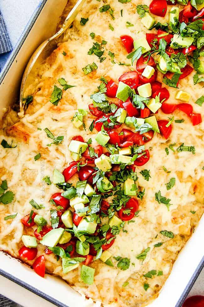 These are the BEST Green Chile Chicken Enchiladas I have ever had!!! They are easy to make, satisfyingly rich, cheesy, creamy and saucy - no dry chicken enchiladas here! And the homemade green chile sour cream white sauce is out of this world!