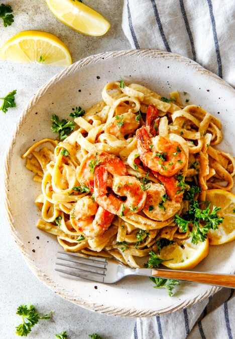 20 MINUTE Lemon Garlic Shrimp Fettuccine is wonderfully creamy, bursting with flavor and so easy! The most gourmet tasting dinner you can make in under 30 minutes!