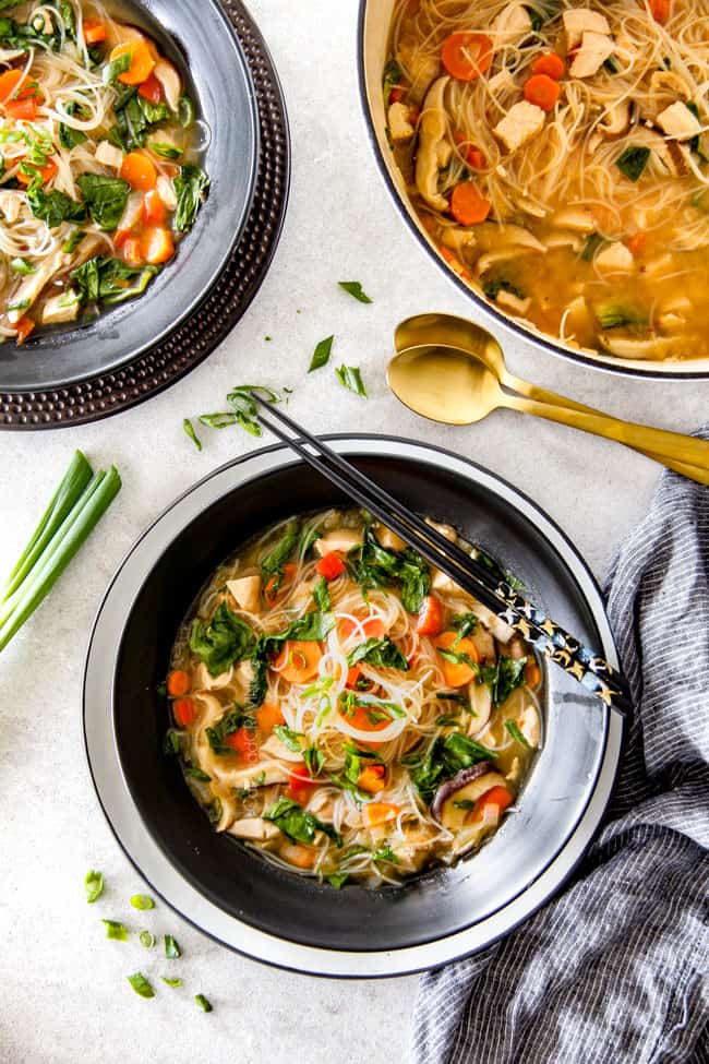Miso Soup in a black bowl.