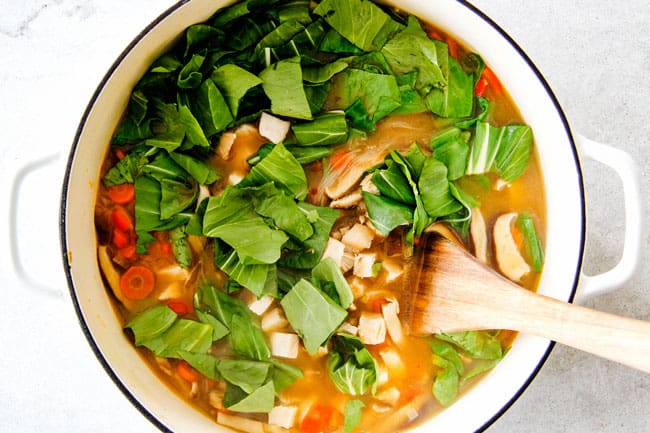 Miso Soup adding vegetables.