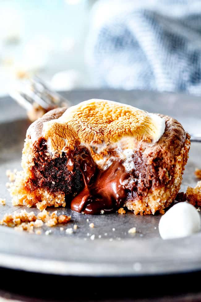 Side view of S'mores Molten Lava Pies with chocolate melting out.