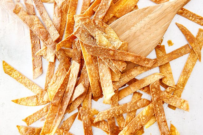 Showing How to Make Tortilla Strips for Chicken Tortilla Soup by baking on baking sheet until golden