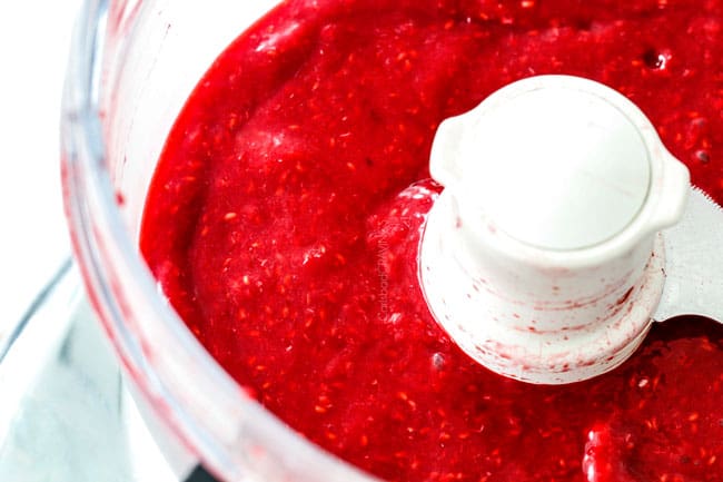 showing how to make homemade raspberry jam by pureeing raspberries in food processor for Chocolate Cake with Raspberry Filling