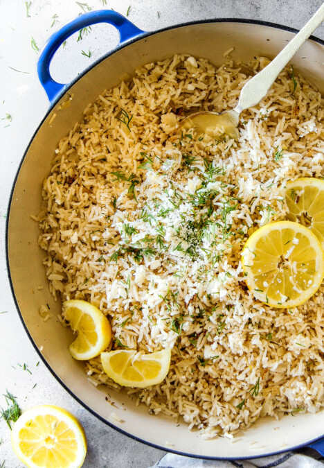 Showing how to make Lemon Rice in rice cooker by adding all ingredients to rice cooker