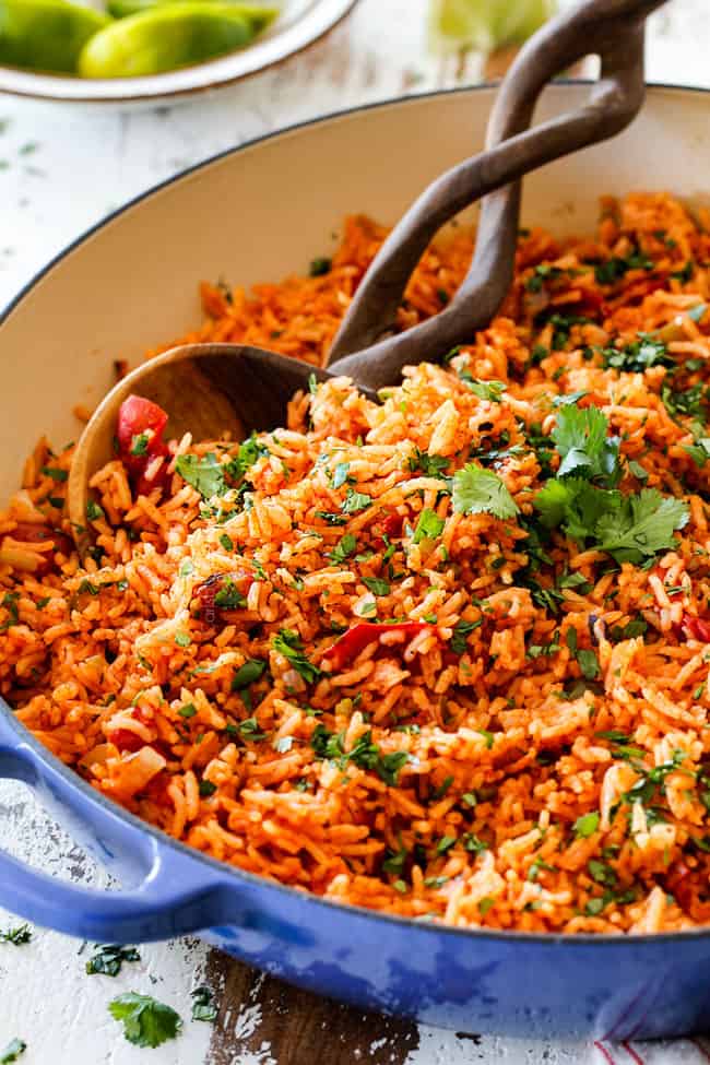 authentic Mexican rice with fire roasted tomatoes in a blue skillet