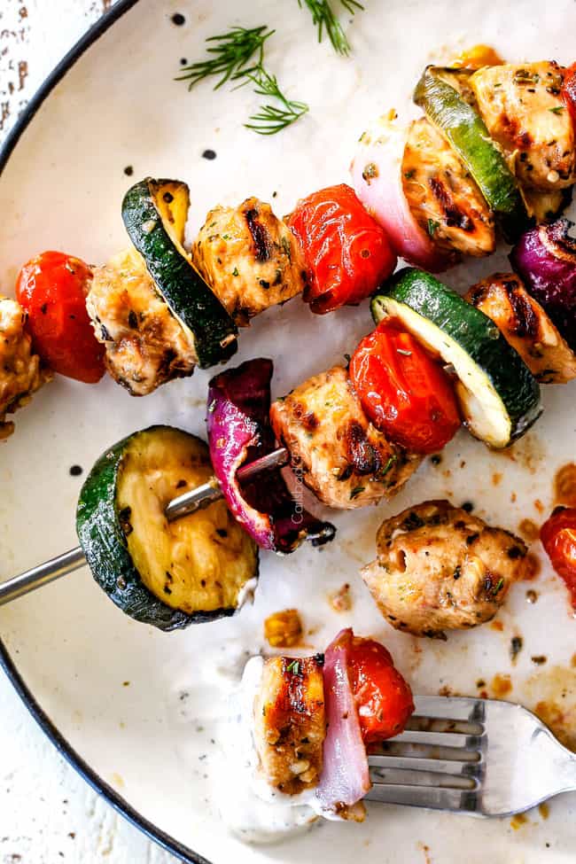 Chicken Souvlaki on a plate with tzazkiki