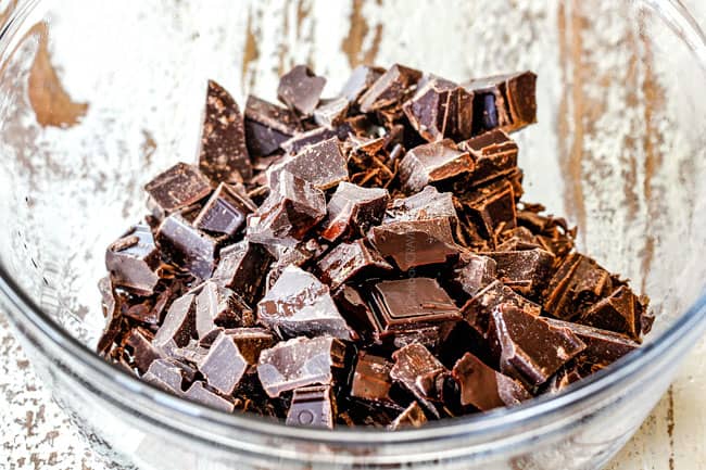 chopped chocolate in a bowl showing How to Make Chocolate Covered Strawberrie