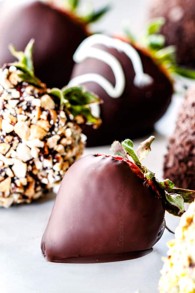 up close of Chocolate Covered Strawberry on Parchment paper