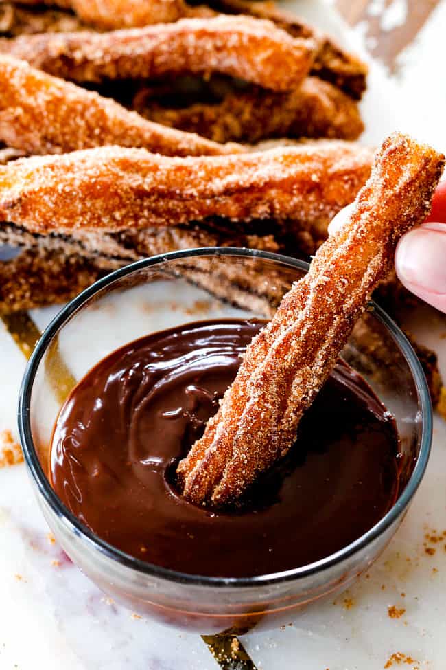 5 Minute Fool Proof Chocolate Ganache (sauce) is silky, creamy, sweet and 1,000 TIMES BETTER than any store bought chocolate sauce. Perfect for brownies, ice cream, cakes, popcorn, strawberries, etc dipping a churro into chocolate ganache