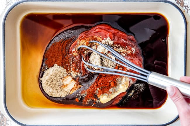 Showing How to make Best Baked Beans by whisking together barbecue sauce, ketchup, Worcestershire sauce, Dijon mustard, molasses together