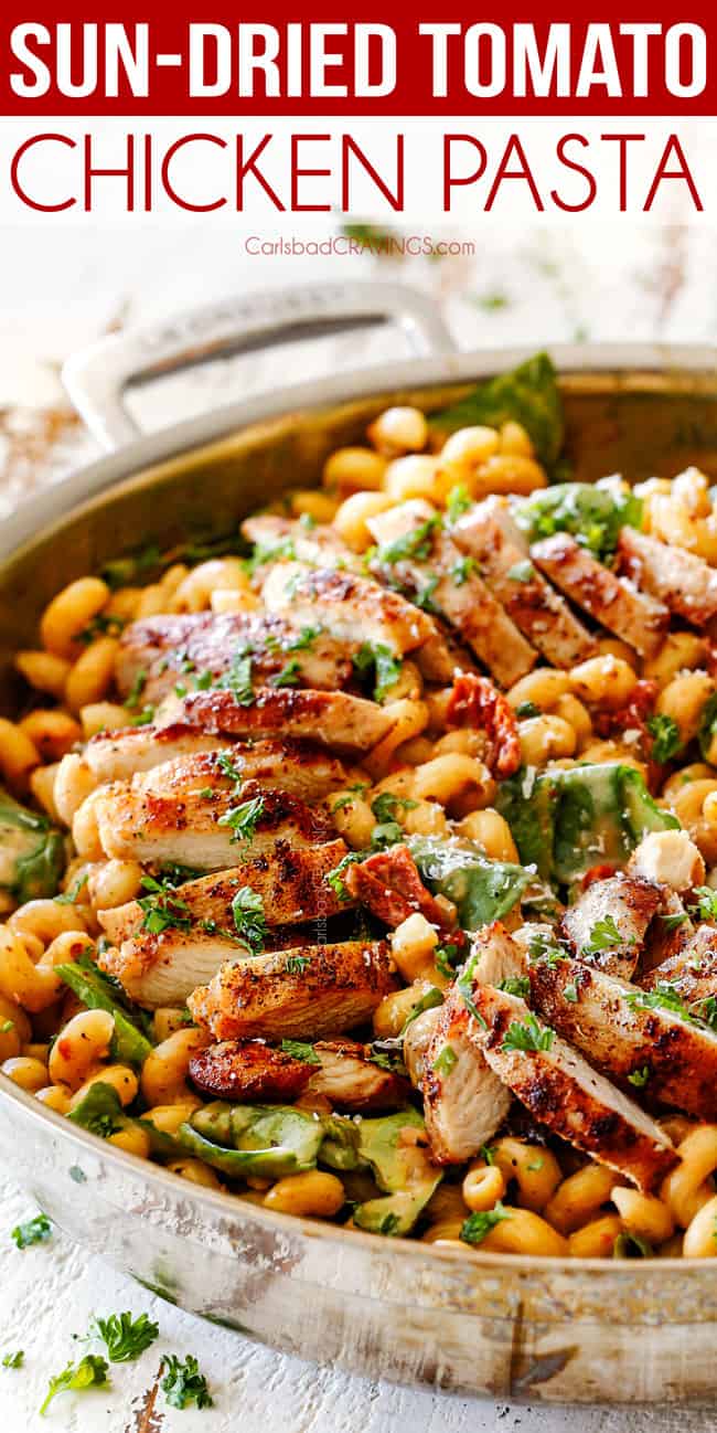 side view of spice rubbed chicken in Sun-dried tomato pasta