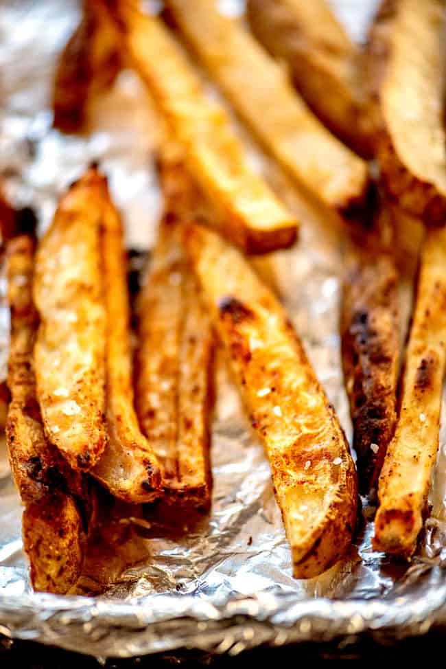 showing how to make breakfast burritos by baking French Fries