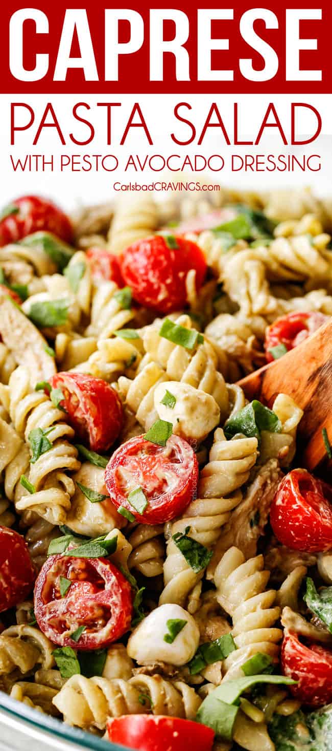 a spoonful of caprese pasta salad with pesto