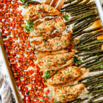 top view of sheet pan chicken and vegetables on a baking sheet