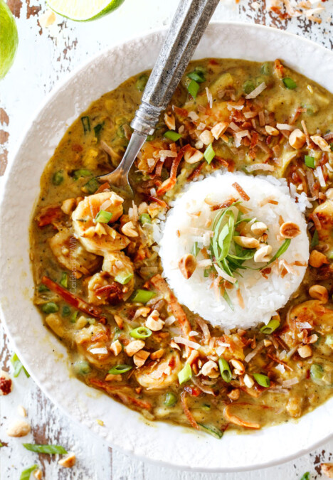 top view of Bang Bang Shrimp Copycat in a white bowl with a pile of rice in the center