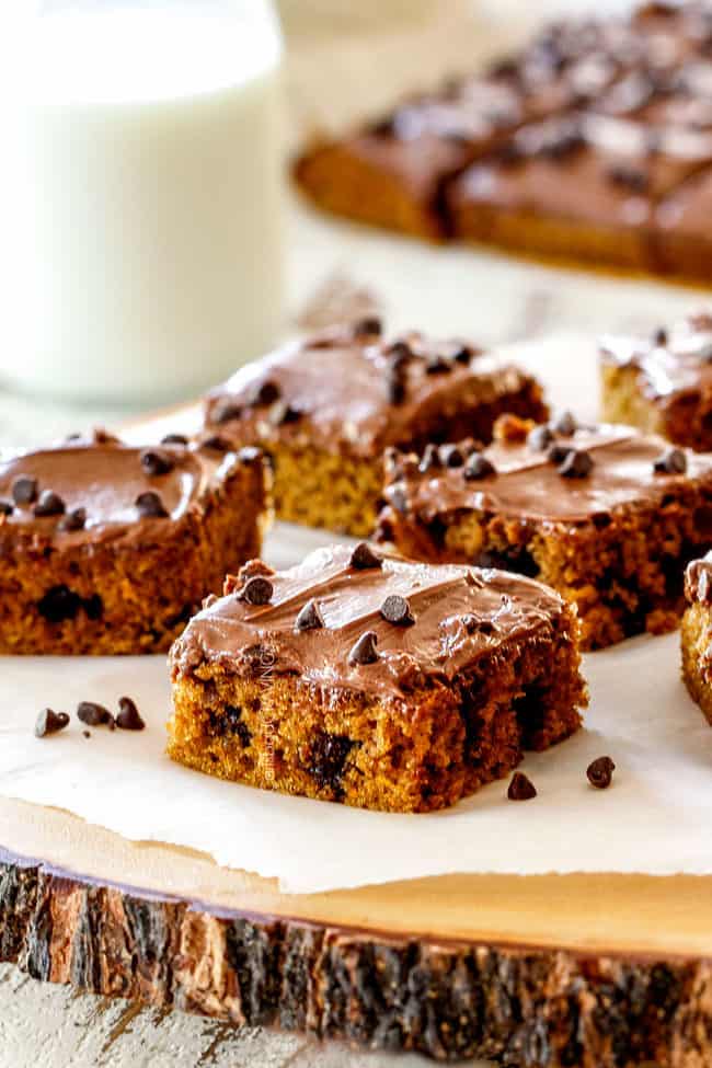 far away shot of easy pumpkin bars on a wood platter