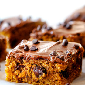 up close front view of easy pumpkin bars with cream cheese frosting