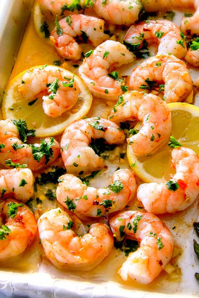 up close of shrimp scampi in butter, lemon, garlic sauce