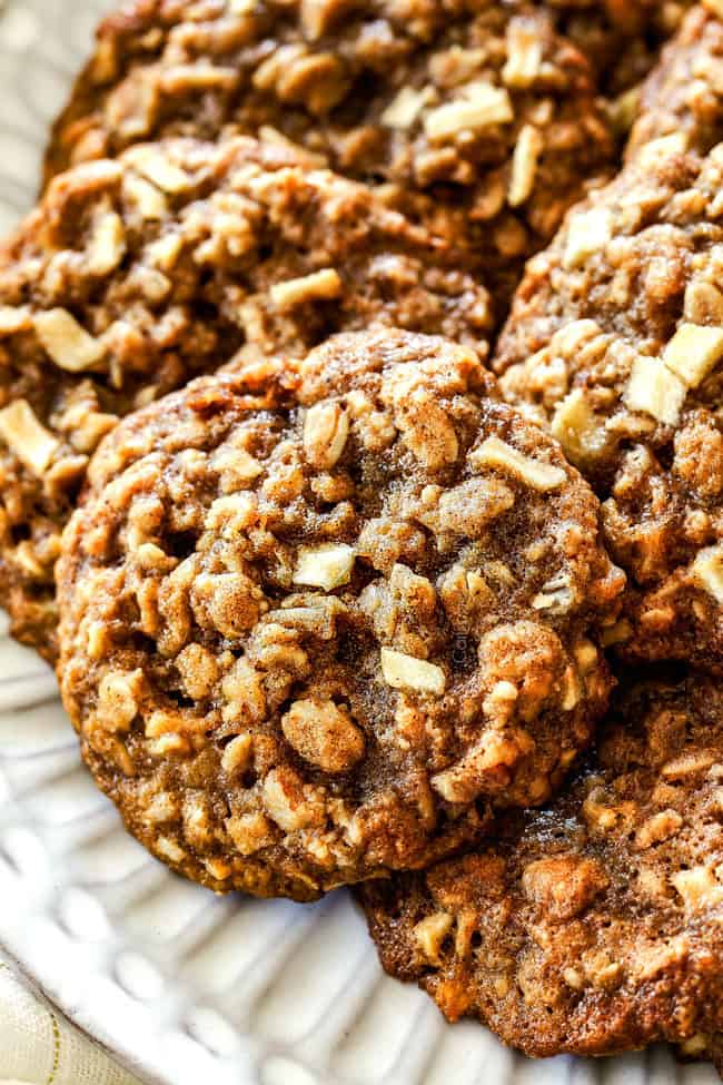 up close of oatmeal apple cookie on a white plate