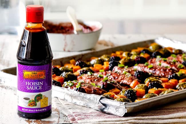 front view of hoisin chicken on a sheet pan with butternut squash and brussels sprouts