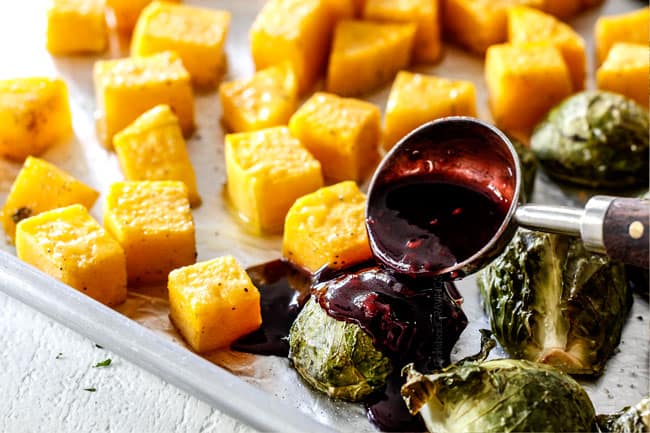 showing how to make hoisin chicken by adding hoisin glaze to vegetables