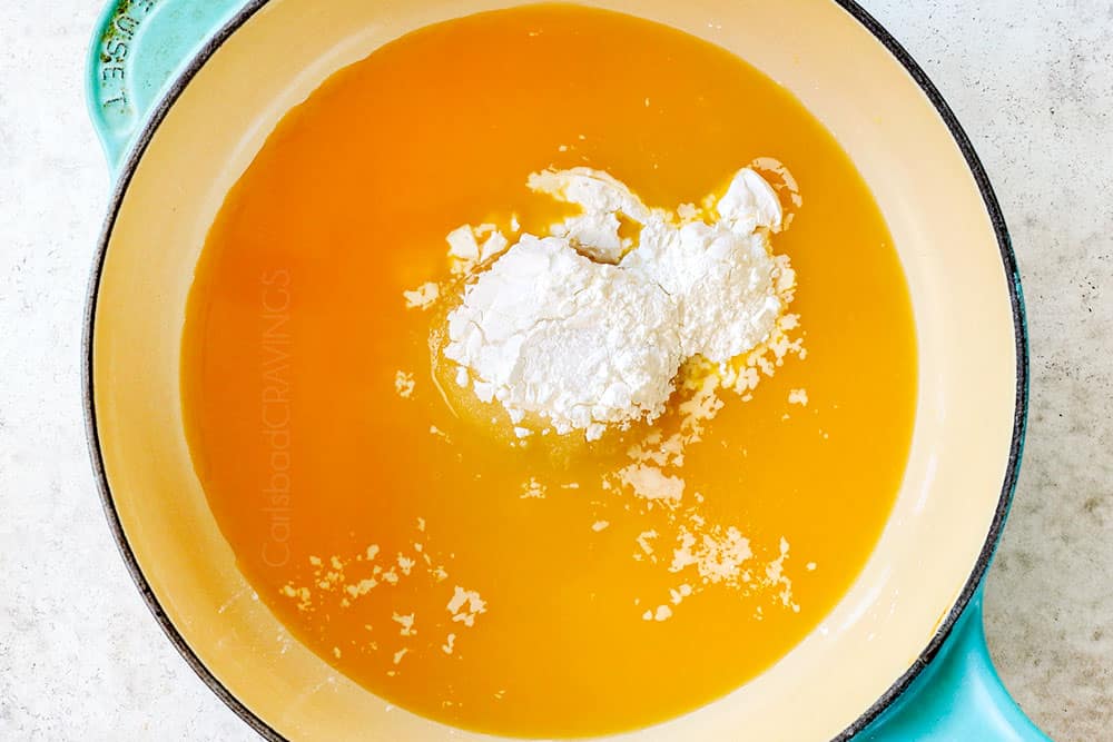 showing how to make fresh blueberry syrup by adding orange juice, lemon juice, sugar and cornstarch to a saucepan