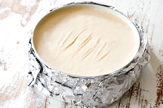 showing how to waterproof pecan pie cheesecake with foil