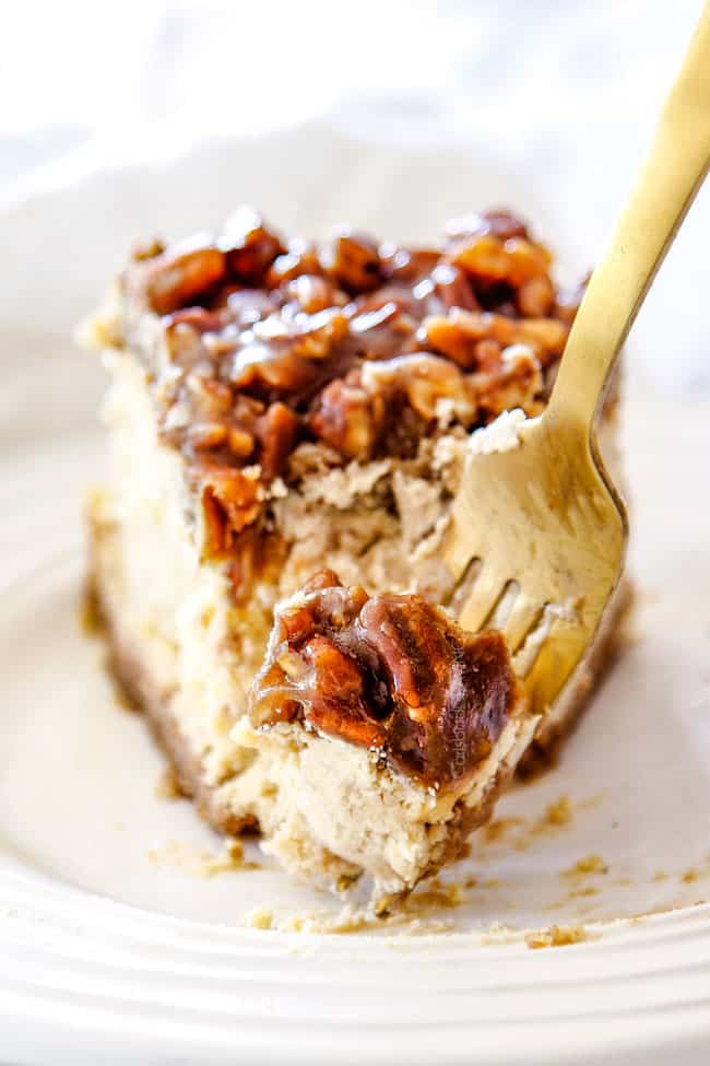 a bite of easy pecan pie cheesecake on a fork