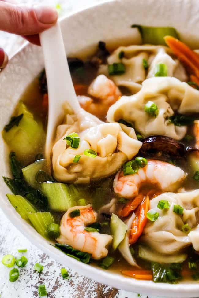 up close of authentic wonton soup recipe in a white bowl