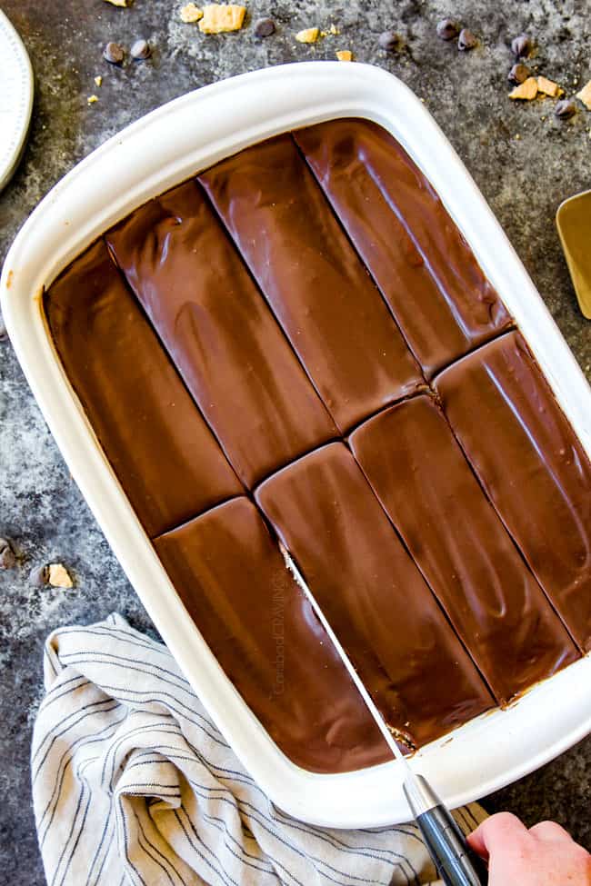 top view of slicing best Chocolate Eclair Cake