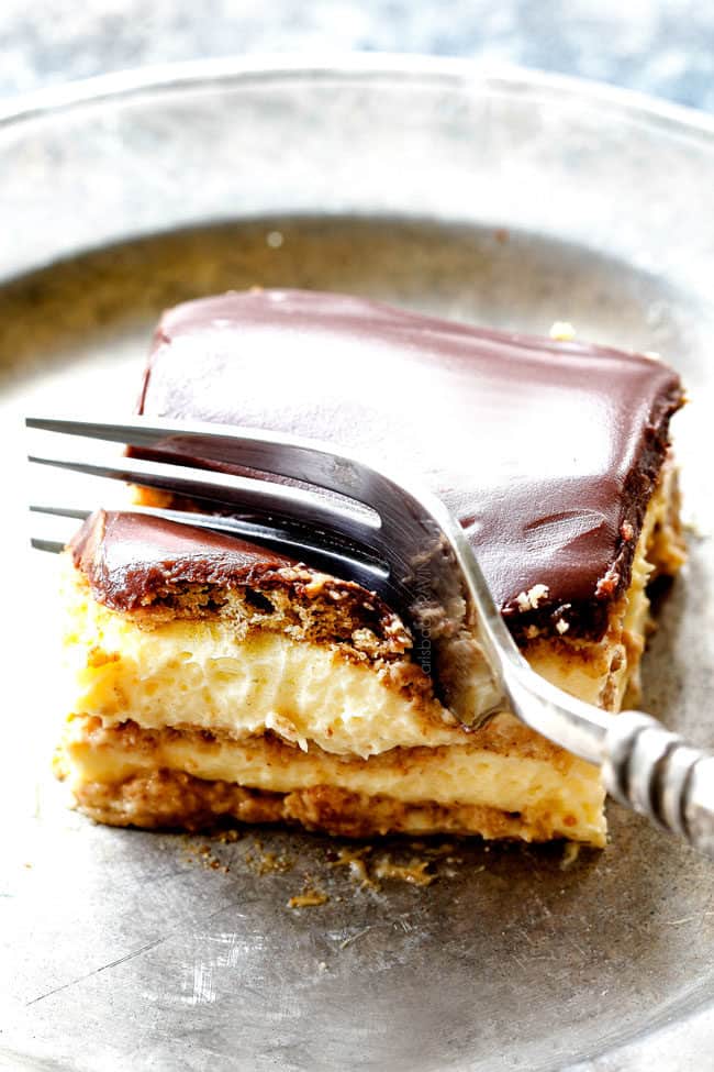 top view of a forking taking a bite of Chocolate Eclair Cake