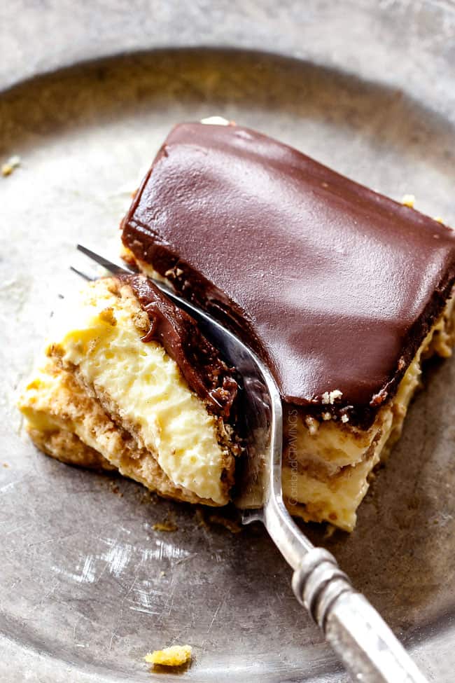 top view of a forking taking a bite of Chocolate Eclair Cake