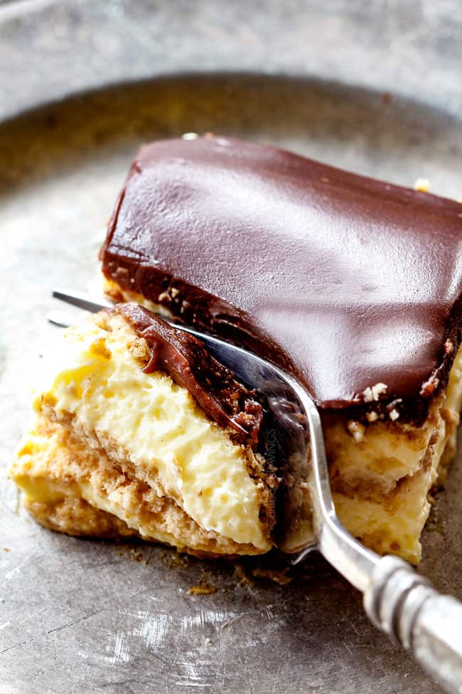 top view of a forking taking a bite of Chocolate Eclair Cake