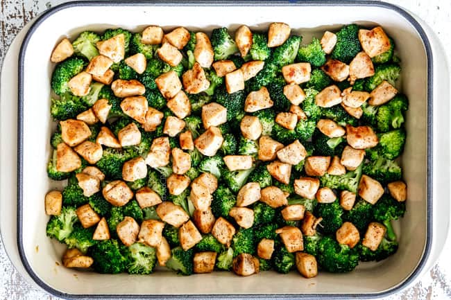 showing how to make easy chicken divan by layering chicken on top of broccoli in a 9x13 casserole dish